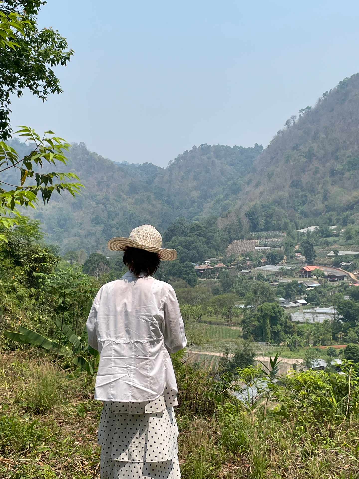 Pranisa overlooking the lush hills and villages of northern Thailand